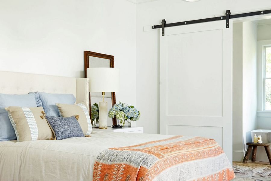 french country bedroom with white bed frame