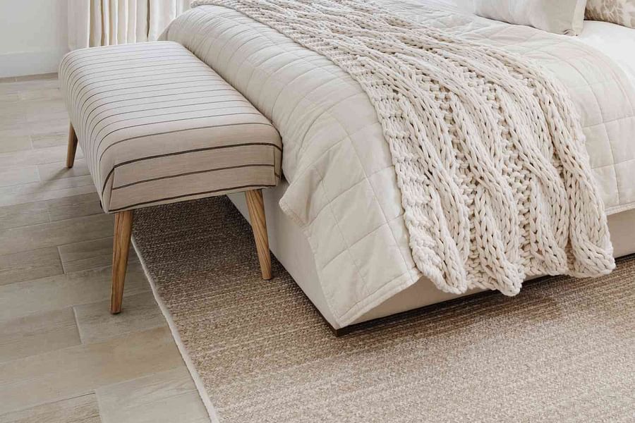 scandinavian bedroom with white bed frame