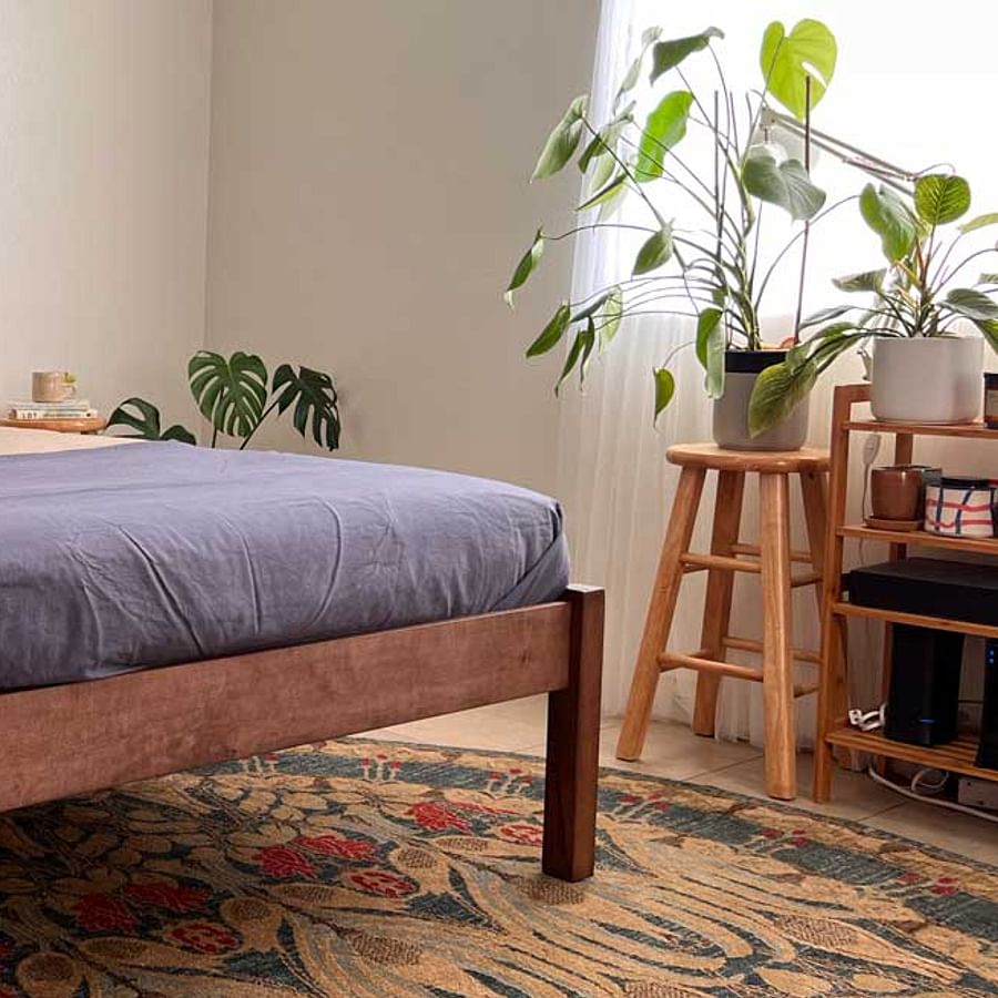 Unboxed Floyd bed frame parts spread out on the floor